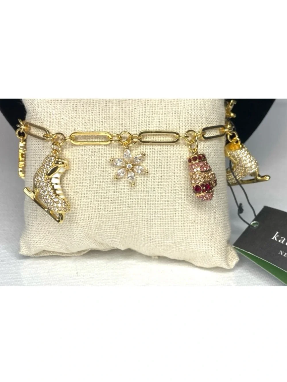 kate spade Gold-Tone Ice Skate & Snowflake Charm Bracelet with Pink Accents - Picture 2 of 9